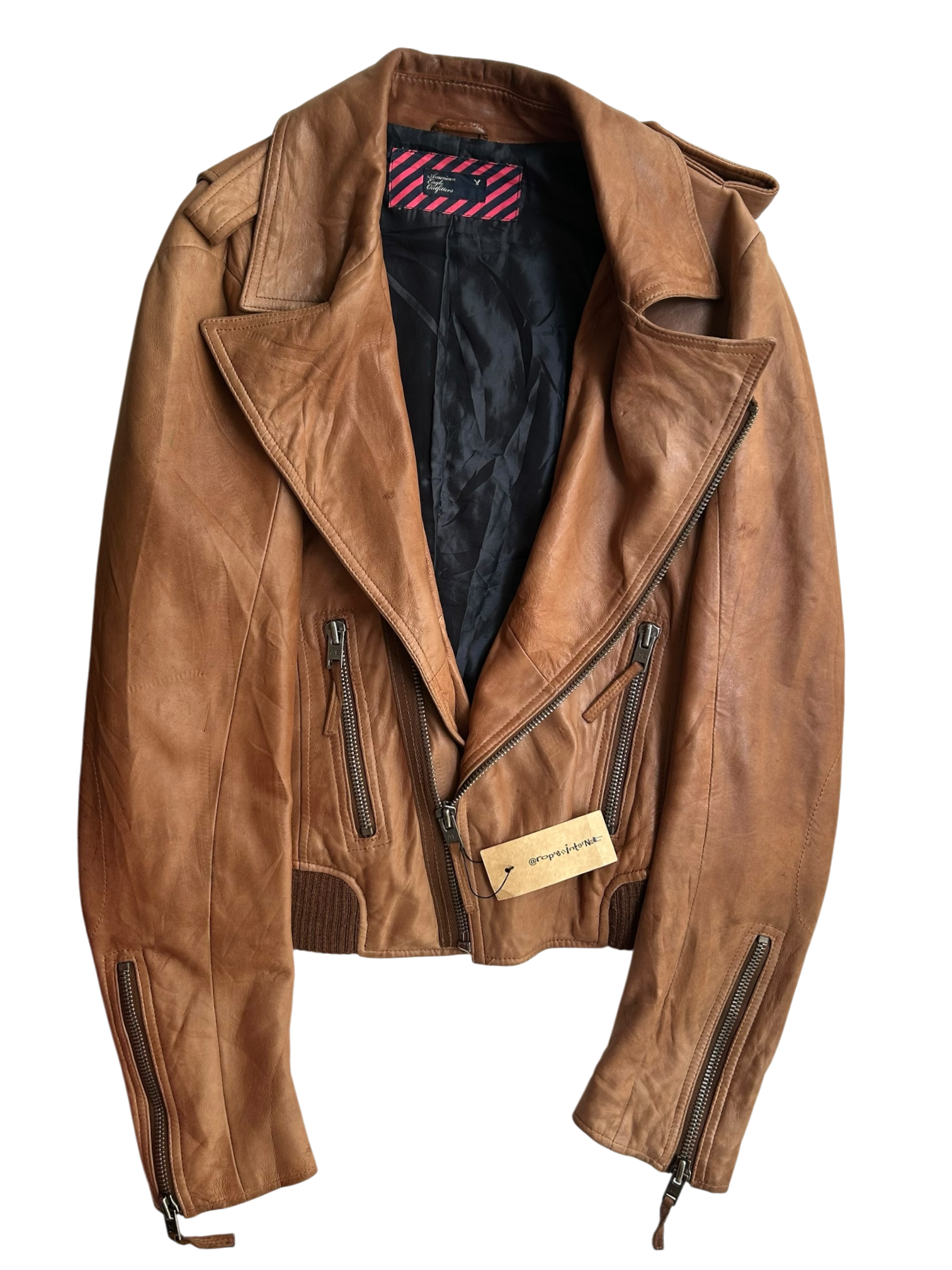 chaqueta café asimétrica
