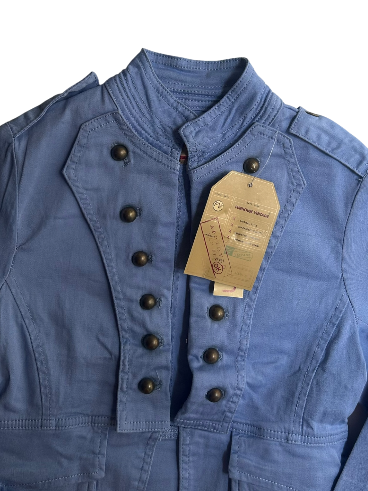 chaqueta azul botones