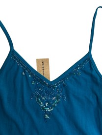 top azul con brillos