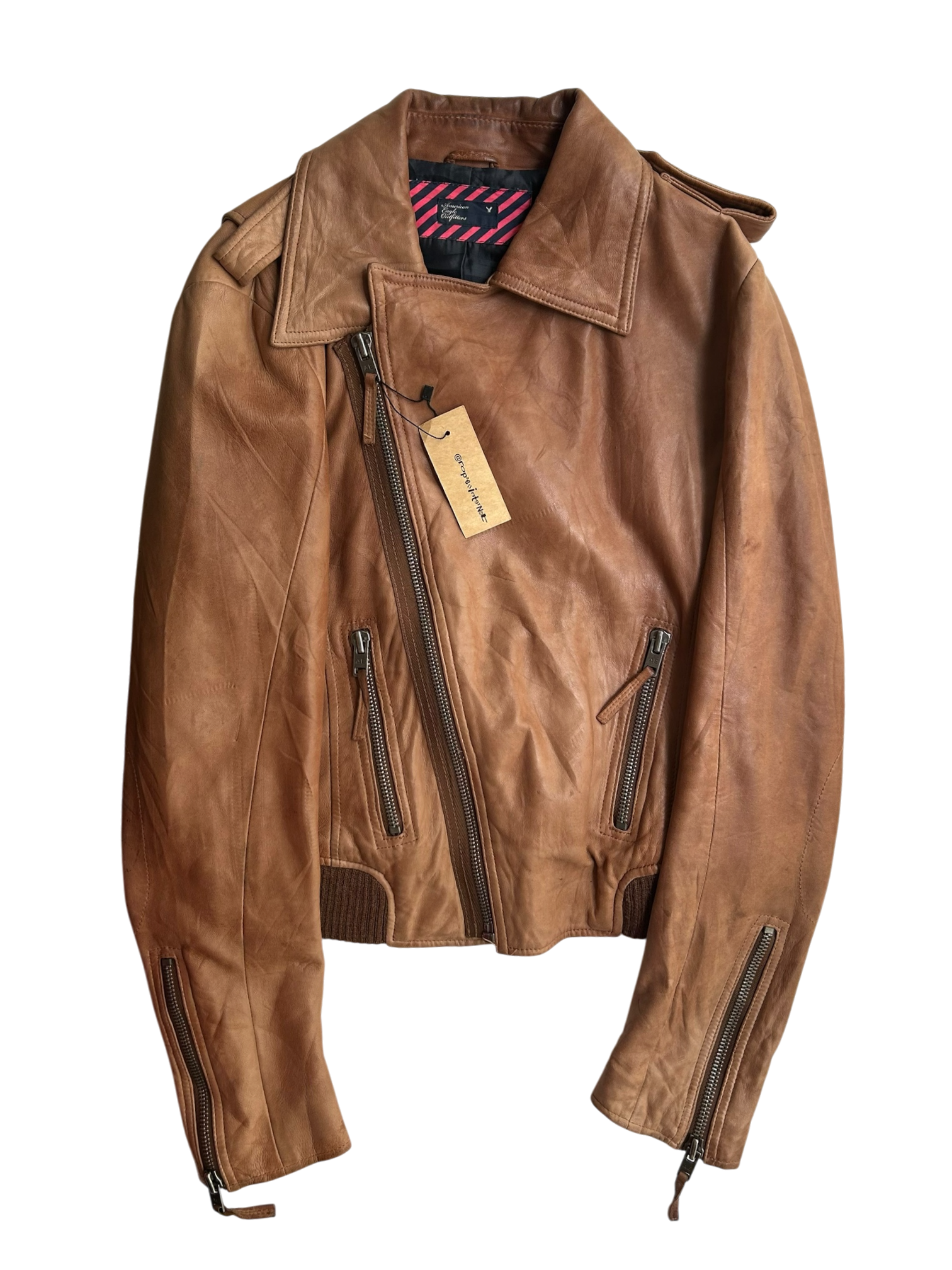 chaqueta café asimétrica